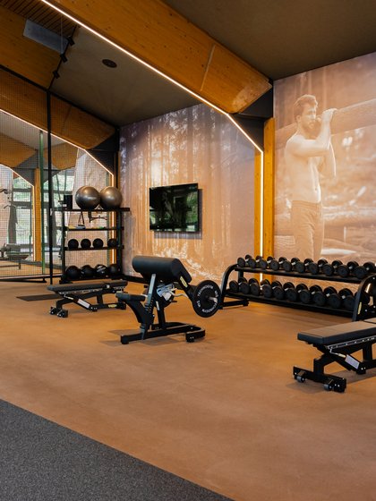 Picture of a gym where you can see a few pieces of equipment